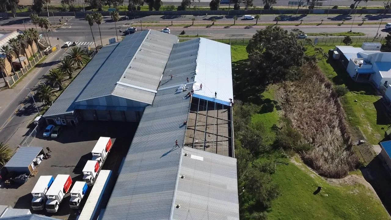 Roofing work on a large commercial property